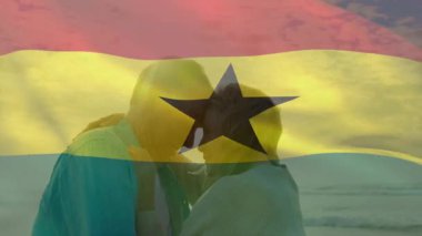 Sahilde kucaklaşan Gana bayrağı animasyon sahnesi olan çift. Romantizm, tatil, seyahat, vatanseverlik, tutku, çok kültürlü