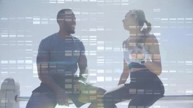 Birlikte oturan iki kişinin DNA dizilimi okul ortamında üst üste biniyor. Bilim, genetik, biyoteknoloji, araştırma, işbirliği, takım çalışması