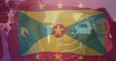 Grenada bayrağıyla kutlama, birlikte animasyon izleyen bir grup insan. Kutlama, vatanseverlik, toplanma, birlik, kültür, festival