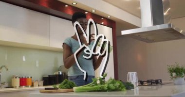 Modern mutfakta sebze hazırlayan kişi barış sembolü animasyon kaplamalı. Aşçılık, sağlıklı, aşçılık, yaşam tarzı