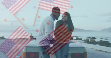 Sahilde, Amerikan bayrağı animasyon örtüsü olan bir çift, birlikte anı paylaşıyorlar. Vatanseverlik, kutlama, birliktelik, aşk, yaz, tatil