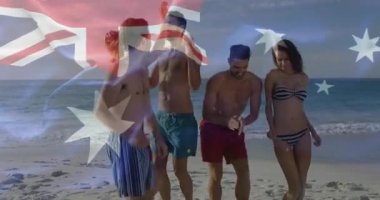 Sahilde dans eden, arka planda Avustralya bayrağı animasyonu olan insanlar. Kutlama, vatanseverlik, yaz, dans, birliktelik, eğlence