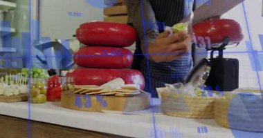 Cheese Wheels ve aperatifler finansal veri animasyonu eşliğinde masada. Gıda, finans, gurme, istatistik