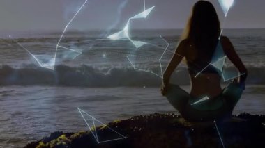 Okyanus tarafından meditasyon, arka planda dijital küre animasyonu olan kişi. Meditasyon, rahatlama, sükunet, teknoloji, doğa, uyum.