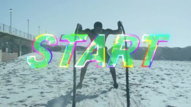 Kumlu plajda koşan, renkli START animasyonu olan biri. Egzersiz, spor, açık hava, atletizm, kıyı, canlı