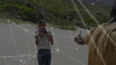 Sahilde ağ bağlantıları ile fotoğraf çeken kişi animasyon örtüsü. Teknoloji, fotoğrafçılık, dijital, bağlantı, yenilik