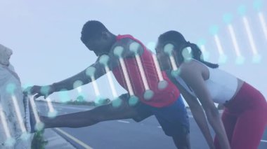 Erkek ve kadın yol kenarında DNA iplikçikleriyle esniyorlar. Fitness, egzersiz, esneklik, sağlık, sağlık, teknoloji