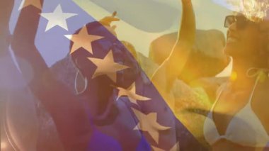 Sunny Park 'ta Amerikan bayrağı animasyonuyla dans etmek, insanların birlikte kutlama yapması. Kutlama, dans, vatanseverlik, tatil, birlik, açık hava