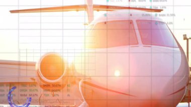 Finansal veriler ve borsa grafikleriyle uçan özel bir jet. Havacılık, finans, iş, teknoloji, lüks, analiz