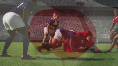 Sahada rugby oynayan sporcular, stadyum koltuklarıyla hareket halindeler. Spor, atletizm, rekabet, takım çalışması