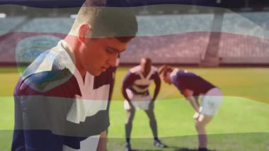 Kosta Rika bayrağı animasyon örtüşen ragbi oyuncuları sahada strateji kuruyor. Takım çalışması, sporcular, strateji, rekabet, takım sporları, ulusal gurur