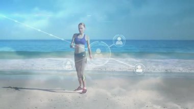 Sahilde egzersiz yapan, dijital ağ bağlantılarının animasyonunu yapan bir kadın. Fitness, teknoloji, egzersiz, okyanus, sağlık, yenilik