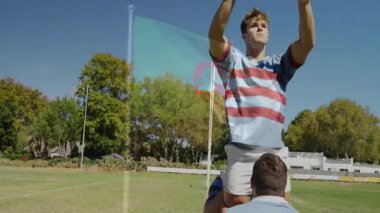 Rugby topu tutuyor, Cezayir bayrağı taşıyan oyuncu arka planda sallanıyor, animasyon. Spor, atlet, yarışma, takım çalışması, aksiyon, oyun