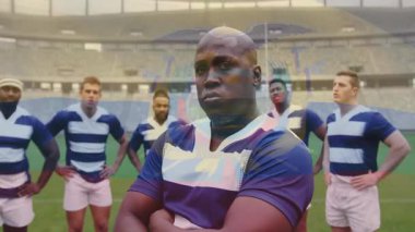 Sahada, rugby takımı stadyumda bayrak animasyonuyla ayakta duruyor. Spor, takım çalışması, birlik, rekabet, sporcular, kutlama