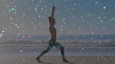 Sahilde renkli konfeti animasyonu eşliğinde yoga yapan biri. Meditasyon, sağlık, rahatlama, farkındalık, sükunet, doğa.