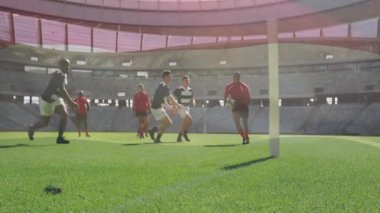 Gol atmak için dalan, kırmızı formalı ragbi oyuncusu stadyum animasyonunda. Spor, atlet, aksiyon, skor, rekabet, takım çalışması