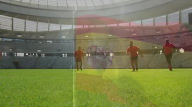 Sahada, büyük stadyum animasyonunda İspanyol bayrağı taşıyan futbolcular vardı. Spor, takım, kutlama, rekabet, atletizm, etkinlik