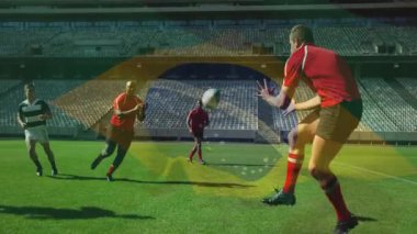 Sahada rugby oynuyor, stadyumda Brezilya bayrağı animasyonu yapan oyuncular. Spor, takım, rekabet, çim, takım çalışması, atlet