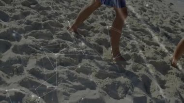 Kanal bağlantılarıyla kumsalda yürüyen kişi animasyon örtüsüyle. Teknoloji, bağlantı, dijital, iletişim, kavram, yenilik