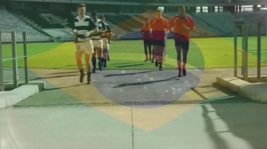 Brezilya bayrağı animasyonuyla stadyumda rugby oyuncularına koşuyor. Spor, takım çalışması, rekabet, zafer, kutlama, sporcular