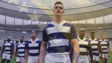 Stadyumda, mavi beyaz üniformalı ragbi oyuncuları bayrak animasyonu yapıyorlar. Spor, takım, yarışma, atletizm, bayraklar, birlik