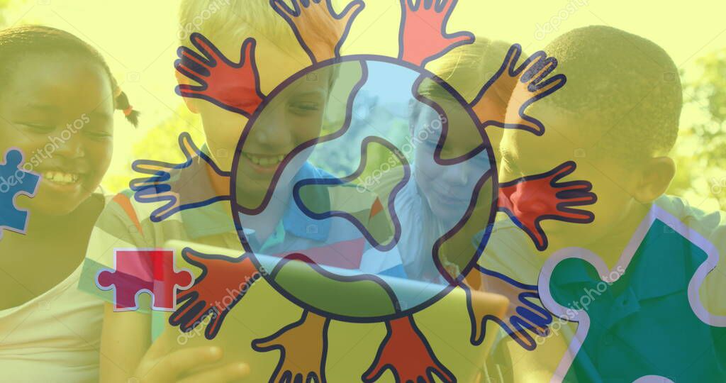 Image of globe with hands logo colorful puzzle pieces over happy playing children. autism, learning difficulties, support and awareness concept digitally generated image.