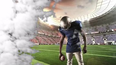 Stadyumda, Amerikalı futbolcu sahada dramatik duman animasyonuyla koşuyor. Spor, atlet, yarışma, aksiyon, hareket, dinamik