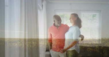 Evde, çiçek animasyonuyla örtülü bir çift, birlikte gülümsüyor. Beraberlik, ilişki, mutluluk, dijital sanat, yaratıcı, çiçekli