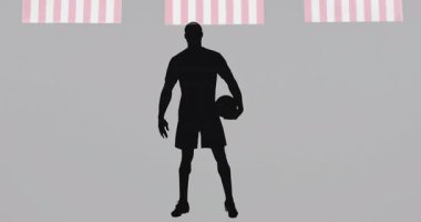 Arka planda Amerikan bayrakları sallanan basketbol oyuncusu silueti. Spor, vatanseverlik, rekabet, takım ruhu, ulusal, atletik