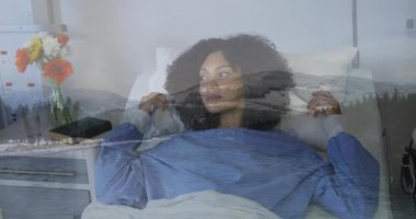 Huzurlu göl ve dağ animasyonlu hastane yatağında dinlenen bir kadın. İyileşme, iyileşme, sakinlik, doğa, rahatlama, huzur