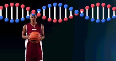 Top tutan kadın basketbolcunun üzerindeki DNA ipliği. global spor, fitness ve veri işleme konsepti dijital olarak oluşturulmuş görüntü.
