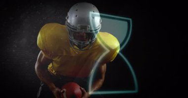 Top koşturuyor, Amerikan futbolcusu kum saati animasyon arka planında. Spor, atlet, yarışma, oyun, hareket, üniforma