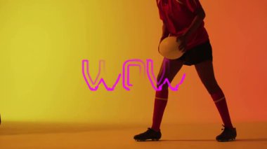 Topla diz çökmüş, kırmızı üniformalı atlet ve cesur animasyon metni. Spor, atletizm, rekabet, motivasyon, zafer, takım çalışması