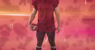 Harfleri değişen ve hücreleri yakınlarda yüzen Amerikalı bir futbolcu. Spor, atlet, animasyon, dijital, teknoloji, hareket