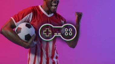 Futbol topunu tutan, renkli arka planda oyun kontrolörü animasyonu olan bir adam. Oyun, dijital sanat, eSports, sanal gerçeklik, eğlence, rekabet