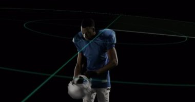Dijital çizgileri ve çizgi çizgileri olan mavi formalı bir futbolcu. Futbol, atlet, spor, teknoloji, siber alan, yenilik