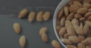 Günbatımı animasyonlu bademler doğayı ve besin uyumunu sergiliyor. Fındık, sağlıklı beslenme, beslenme, gıda, tarım, sağlık