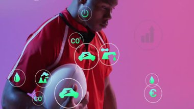 Ragbi topu tutuyor, pembe arka planda çevre animasyonu olan bir sporcu. Spor, yaratıcılık