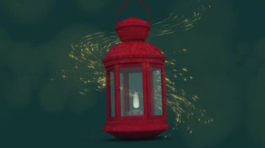 Yeşil zemin üzerinde altın parçacıkları olan yüzen kırmızı fener. Festival, kutlama, gelenek, kültür, ışıltı, animasyon