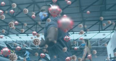 Farklı grupların üzerinde yüzen, yüz maskeleri takan ve spor yapan covid-19 hücrelerinin resmi. Dijital olarak üretilen küresel covid 19salgın konsepti.