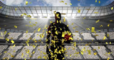 Spor stadyumuna top tutan erkek basketbolcunun siluetine altın konfeti düştü. Spor yarışması ve turnuva konsepti