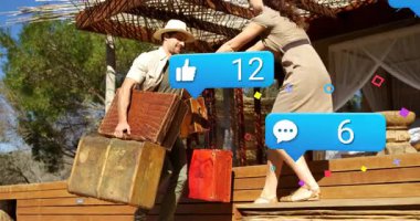 Bagaj taşıyorlar, arka planda sosyal medya ikonlarının canlandırılmasıyla çevrili bir çift. Seyahat, tatil, macera, dijital, teknoloji, bağlantı