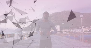 Geometrik şekillerin, gezinti güvertesinde koşan Afro-Amerikan formundaki hali. Sportif ve formda yaşam tarzı, açık havada kişisel eğitim..