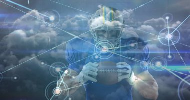 Bulutların görüntüsü ve Amerikan futbolcu ile topun bağlantıları. spor ve kutlama konsepti dijital olarak oluşturulmuş görüntü.