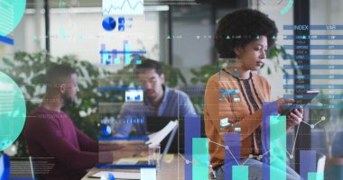 Statistical data processing against thoughtful african american woman using digital tablet at office. business technology concept