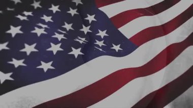 Amerikan bayrağı yakından dalgalanıyor, düz dizaynlı kırmızı beyaz çizgili mavi kantonu gösteriyor. Vatanseverlik, kumaş, doku, amblem, sembolizm, ulusal, kumaş ayrıntıları