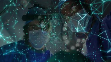 Cerrahi ışık altında ameliyat yapan iki cerrah holografik ağ düğümleri tasarlıyor. Tıbbi, yenilik, fütüristik, takım çalışması, kesinlik, sağlık, teknoloji