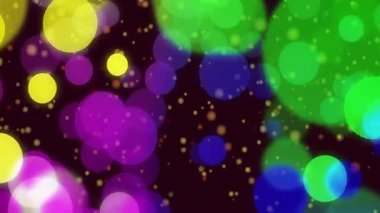 Çok renkli, parlayan bokeh daireler. Karanlık zemin üzerinde dans ediyorlar. Parlayan ışık lekeleri var. Soyut, enerjik, aydınlık, renkli, gelecekçi, dijital, şenlikli