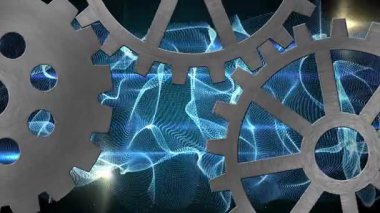 Mavi ağ üzerinde dönen üç fırçalı çelik dişli kehribar kıvılcımları ve parlayan mercek fişekleri yayıyor. Mekanik, fütüristik, endüstriyel, teknoloji, sibernetik, soyut, yenilik