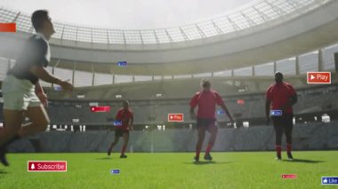 Rugby oyuncuları spor pazarlaması için yüzen sosyal simgelerle sahada top tutarak zıplıyorlar. Eylem, yoğunluk, atletizm, enerji, rekabet, açık hava, canlı